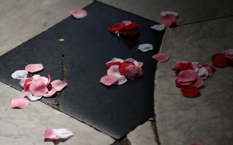 Poppy petals lie on the floor during a service in St Pauls Cathedral to commemorate the tenth anniversary of the London Bombings in London, Tuesday, July 7, 2015. Fifty-two people lost their lives, and hundreds more were injured in co-ordinated terrorist attacks on the London transport network on July 7, 2005. (AP Photo/Frank Augstein,pool)