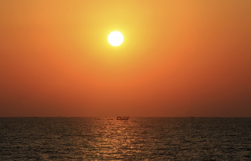 Palestinian fishermen sail into waters of the Mediterranean Sea at sunset in Gaza in the northern Gaza Strip on Thursday, July 30, 2015. (AP Photo/Adel Hana)