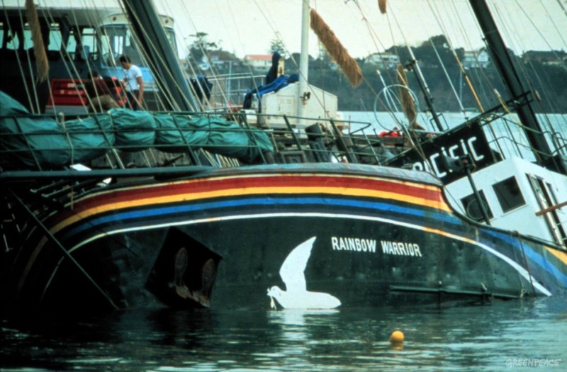 Rainbow Warrior lists in the Auckland Harbour after bombing by French secret service agents. (Greenpeace)