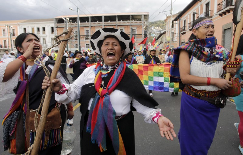 Indian women lead a march as they arrive to Quito during a protest called by the Confederation of Indian Nationalities of Ecuador, in Quito, Ecuador, Wednesday, Aug. 12, 2015. Demonstrators converged on the Capital from around the country and will participate in a national strike on Thursday to protest against policies of president Rafael Correa. (AP Photo/Dolores Ochoa)