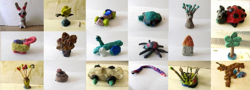 A collection of small clay sculptures, many in the shape of plants or animals, created by the children of asylum seekers in Arad, Israel. David and Ana Camusso Wapner work with these refugees to help them express themselves while awaiting their fates in imperialist Israel. (ProMosaik)
