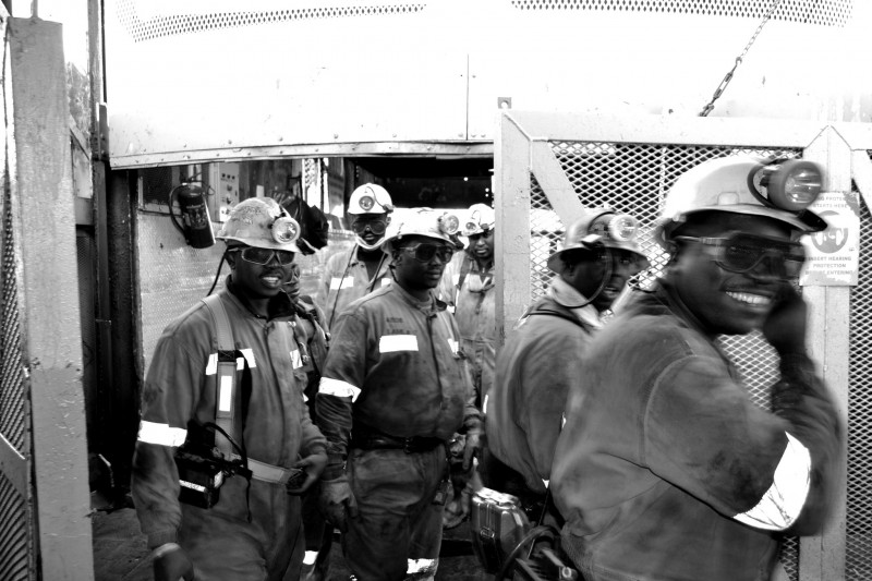 File: A group of coal miners at the end of their shift in a South African coal mine, photographed on September 12, 2014. (Flickr / Jan Truter)