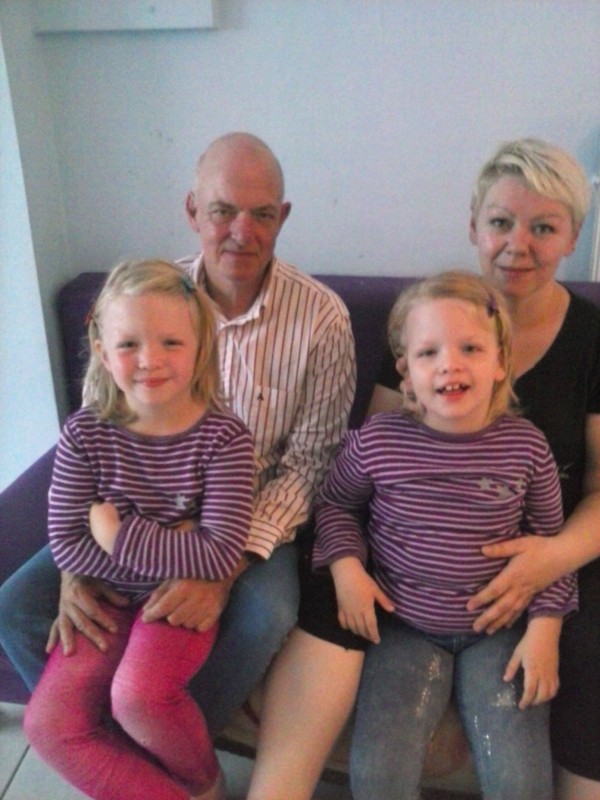 Sofie Voncken sits with her parents and her twin sister, Sara. (Jean-Pierre Voncken)