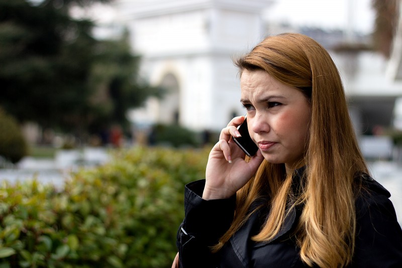 File: A woman speaks on a smartphone in Pella Square in Skopje, Macedonia. (Flickr / Marjan Lazarevski)