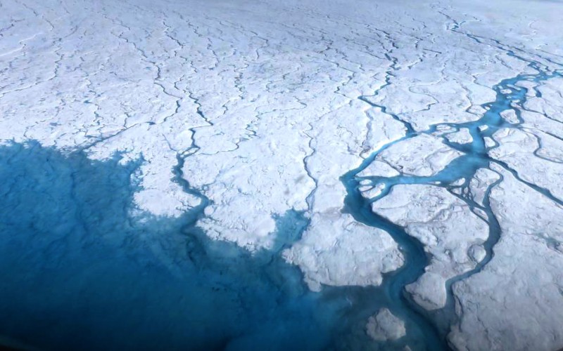 In this July 19, 2015 photograph, rivers can be seen forming on top of Greenland's ice sheet in the summer heat. (Flickr / NASA Goddard Space Center / Maria-José Viñas)