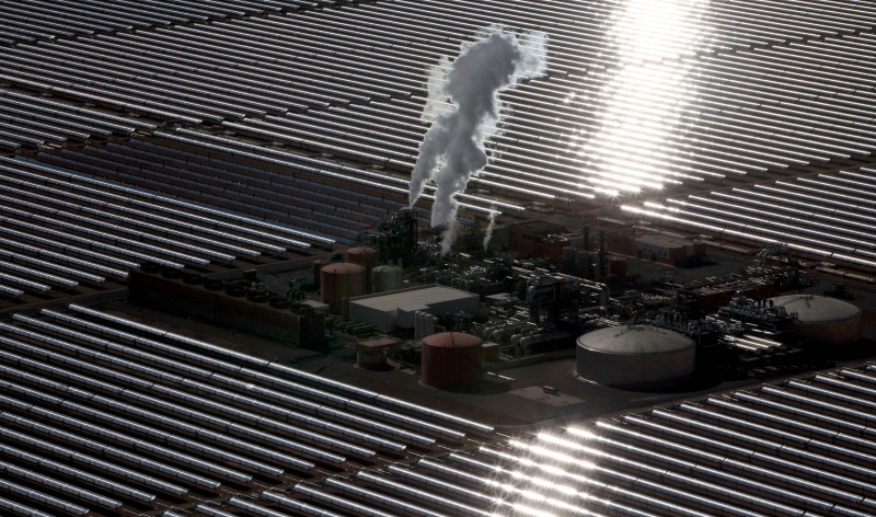 Sunlight is reflected from panels at a solar plant of Ouarzazate, central Morocco, Thursday, Feb. 4, 2016. Morocco's King Mohammed VI unveiled one of the world's biggest solar plants Thursday, taking advantage of the Sahara sunshine and a growing global push for renewable energy. (AP Photo/Abdeljalil Bounhar)