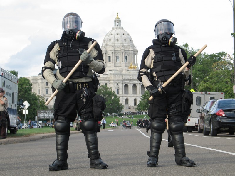 Image result for police in riot gear and masks rnc 2008 nigel parry
