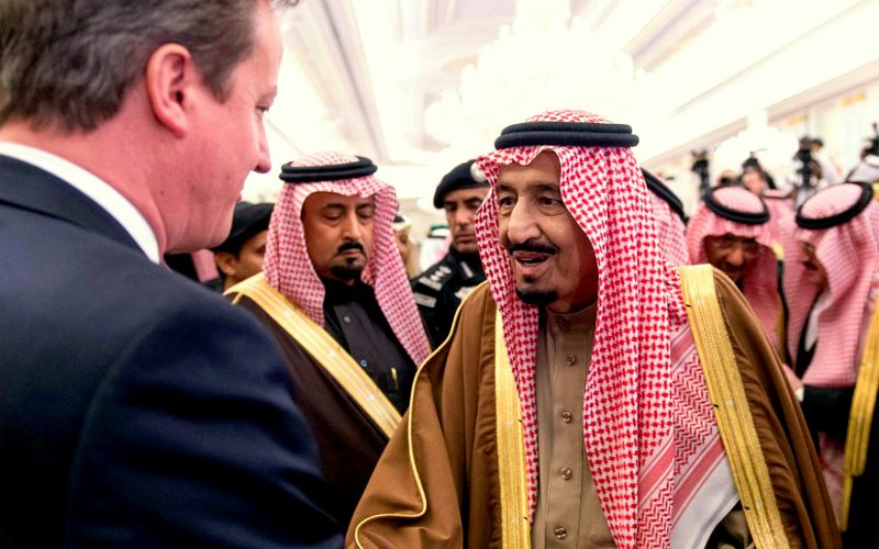 In this photo provided by the Saudi Press Agency, newly enthroned Saudi King Salman, right, greets the Prime Minister of the United Kingdom, David Cameron, left, in the king's dewaniya, a traditional Arab reception area to receive guests, where Cameron offers condolences for late King Abdullah, in Riyadh, Saudi Arabia, late Saturday, Jan. 24, 2015. Heads of state and royals from around world will be visiting Saudi Arabia over the coming days to pay their respects in meetings with Saudi royals. Powerful heads of tribes, as well as average Saudi citizens, will also meet the new king to give their condolences and express pledges of loyalty to him. (AP Photo/SPA)