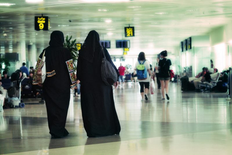Women walk through an airport in Doha, Qatar on June 30, 2010. Two of the women are wearing niqab. (Flickr / Juanedc.com)