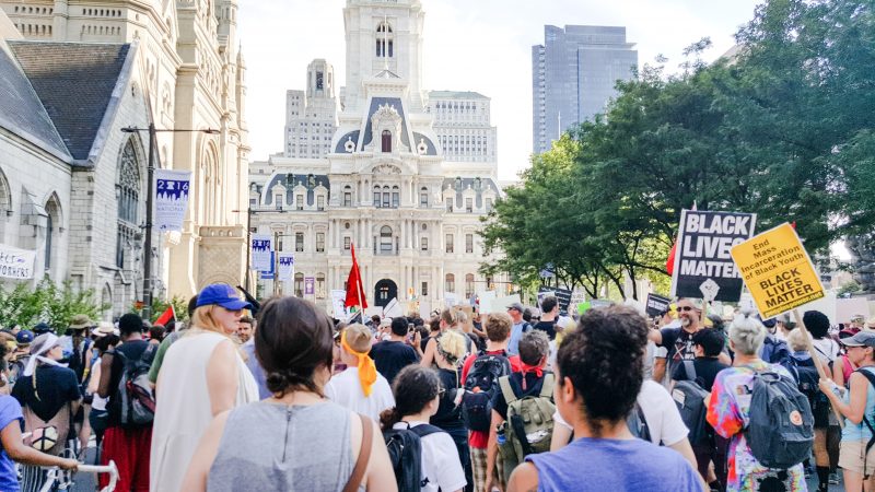 In this July 26, 2016 photograph, a march for black lives (and against the Democratic National Convention), organized by Philly Coalition for REAL Justice, marches through the streets to Philadelphia City Hall. (Kit O’Connell)
