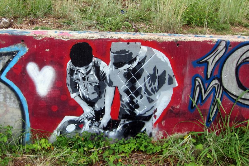 A mural of a pair of DJs working together to create music. Photographed August 18, 2012 at the HOPE Outdoor Gallery, a collaborative temporary art space in Austin, Texas. (Flickr / Wally Gobetz)
