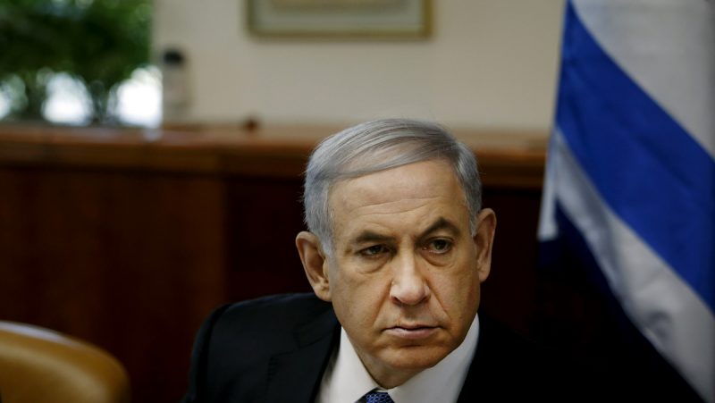 Israel's Prime Minister Benjamin Netanyahu chairs the weekly cabinet meeting in Jerusalem, Sunday, Nov. 30, 2014. (AP Photo/Ronen Zvulun, Pool)