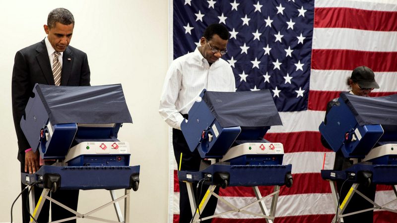 President Barack Obama casts his ballot during early voting at the Martin Luther King Jr. Community Center in Chicago, Ill., Oct. 25, 2012. (Official White House Photo by Pete Souza) This official White House photograph is being made available only for publication by news organizations and/or for personal use printing by the subject(s) of the photograph. The photograph may not be manipulated in any way and may not be used in commercial or political materials, advertisements, emails, products, promotions that in any way suggests approval or endorsement of the President, the First Family, or the White House.