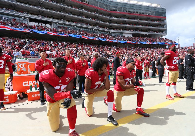 San Francisco 49ers Eli Harold (58), Eric Reid (35) and Colin Kaepernick (7) take a knee during the National Anthem prior to action against the Dallas Cowboys during an NFL football game Saturday, Oct. 2, 2016, in Santa Clara, CA. The Cowboys won 24-17. (Daniel Gluskoter/AP Images for Panini)