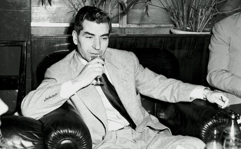 Charlie "Lucky" Luciano, an Italian mobster born in Sicily. Luciano is considered the father of modern organized crime in the United States for splitting New York City into five different Mafia crime families and the establishment of the first commission. He was the first official boss of the modern Genovese crime family. Excelsior Hotel, Rome, June 11, 1948. (Wikimedia Commons / Remo Nassi)