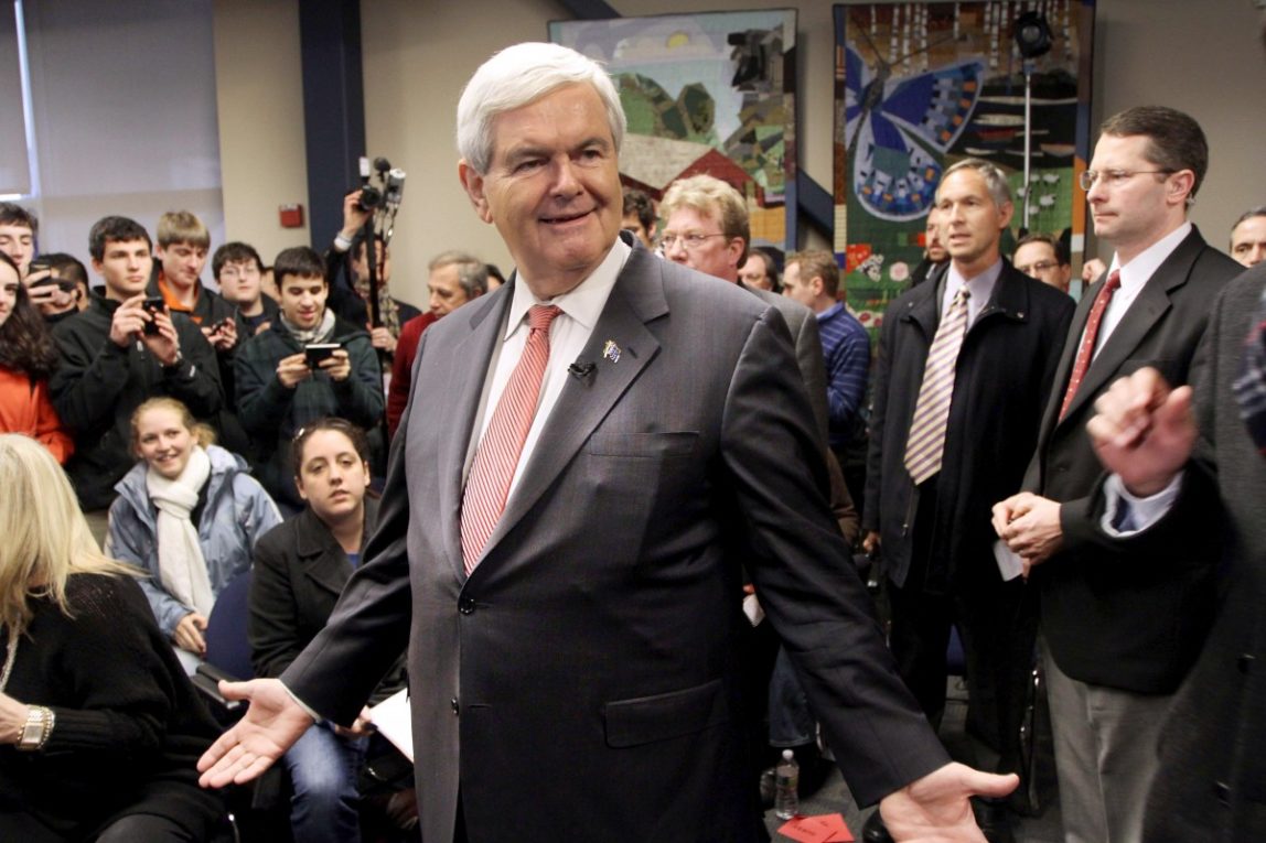 Republican presidential candidate, former House Speaker Newt Gingrich asks his staff, "what's next" during a campaign stop, Monday, Jan. 9, 2012, in Manchester, N.H. (AP Photo/Jim Cole)