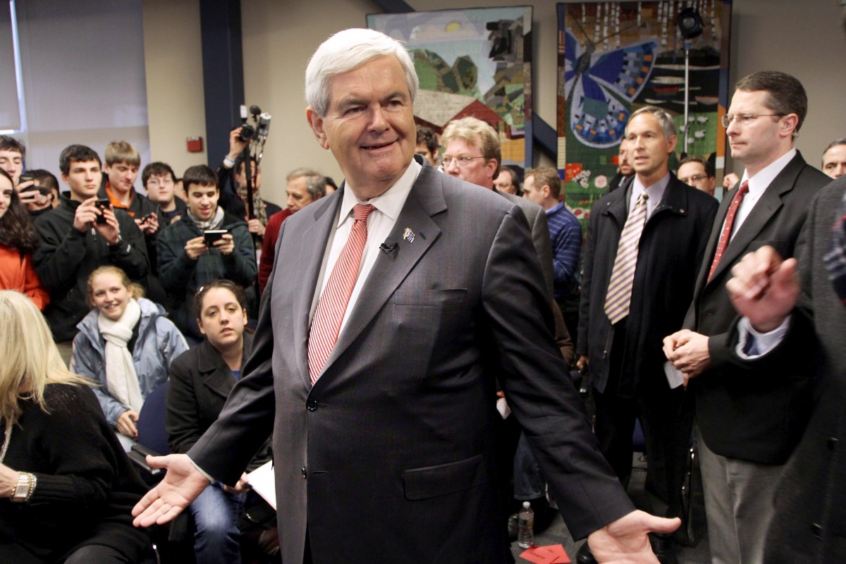 Republican presidential candidate, former House Speaker Newt Gingrich asks his staff, "what's next" during a campaign stop, Monday, Jan. 9, 2012, in Manchester, N.H. (AP Photo/Jim Cole)