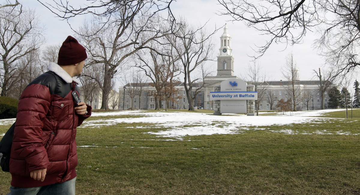 In this Wednesday, Feb. 15, 2012 photo, a person walks on the University at Buffalo campus in Buffalo, N.Y. The New York Police Department monitored Muslim college students far more broadly than previously known, at schools far beyond the city limits, including the University at Buffalo, the Ivy League colleges of Yale and the University of Pennsylvania, The Associated Press has learned. (AP Photo/David Duprey)