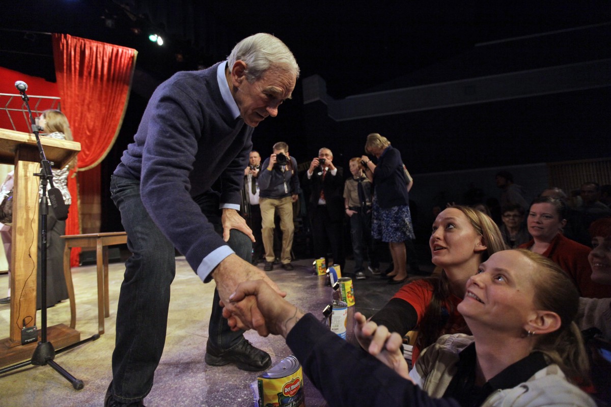 Republican presidential candidate Rep. Ron Paul, R-Texas shakes hands at Twin Falls Senior High School, Thursday, Feb. 16, 2012, in Twin Falls, Idaho. (AP Photo/Marcio Jose Sanchez)