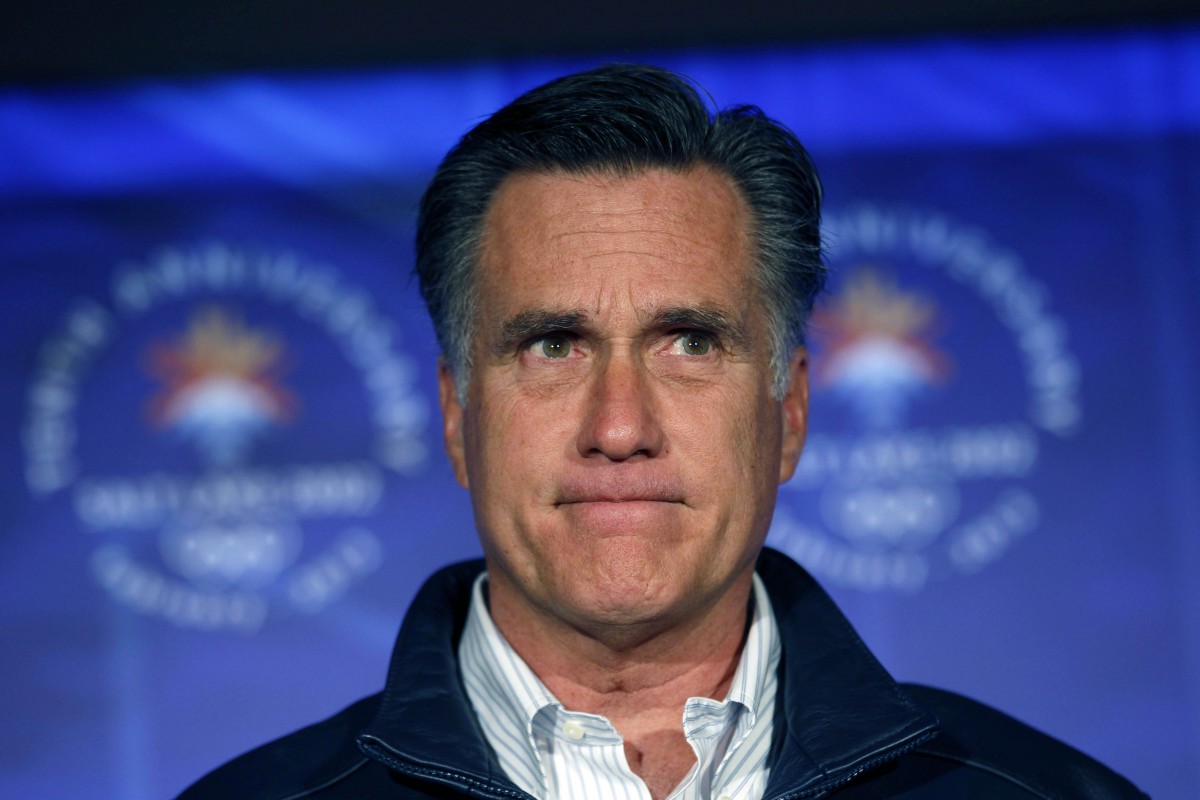 Republican presidential candidate, former Massachusetts Gov. Mitt Romney, pauses while speaking to a group of former Salt Lake City Olympics committee members, marking the tenth anniversary of the games, in Salt Lake City, Utah, Saturday, Feb. 18, 2012. (AP Photo/Gerald Herbert)