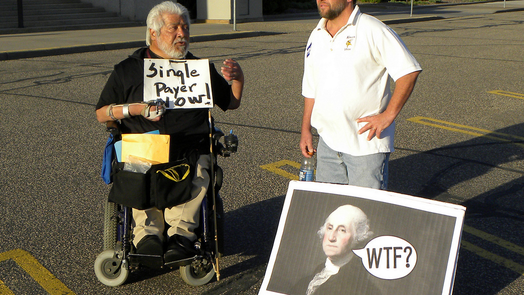 A counter protest for single payer health care at a Tea Party rally at the Minnesota capitol on April 15, 2010. (Photo by Fibonacci Blue)