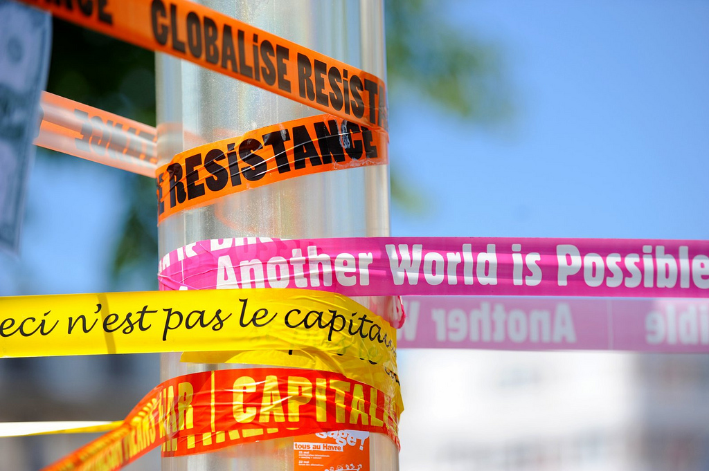 protest banners strung across light poles at the massive anti-G-8 protests in 2011. (Photo by Guillaume Paumier)