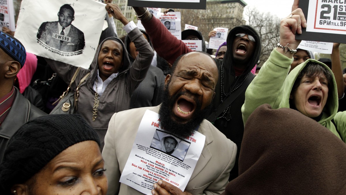 Demonstrators chant Trayvon Martin's name during the Million Hoodie March in Union Square Wednesday, March 21, 2012 in New York. The march was in memory of Martin, a black teenager shot to death by a Hispanic neighborhood watch captain in Florida. The teenager was unarmed and was wearing a hoodie. (AP Photo/Mary Altaffer)