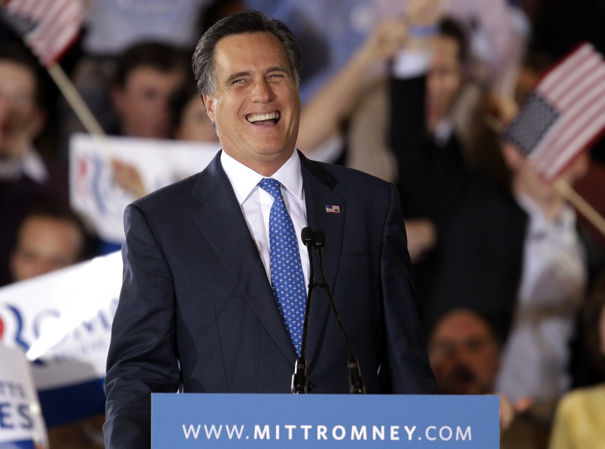 Republican presidential candidate, former Massachusetts Gov. Mitt Romney smiles as he addresses supporters at his Super Tuesday campaign rally in Boston, Tuesday, March 6, 2012. (AP Photo/Stephan Savoia)