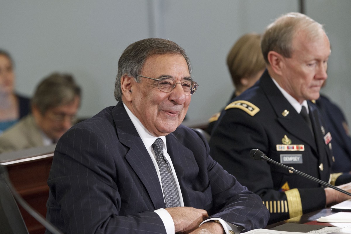 Defense Secretary Leon Panetta, left, accompanied by Joint Chiefs Chairman Gen. Martin Dempsey, testifies on Capitol Hill in Washington, Wednesday, Feb. 29, 2012, before the House Budget Committee hearing on the Defense Department's fiscal 2013 budget. (AP Photo/J. Scott Applewhite)