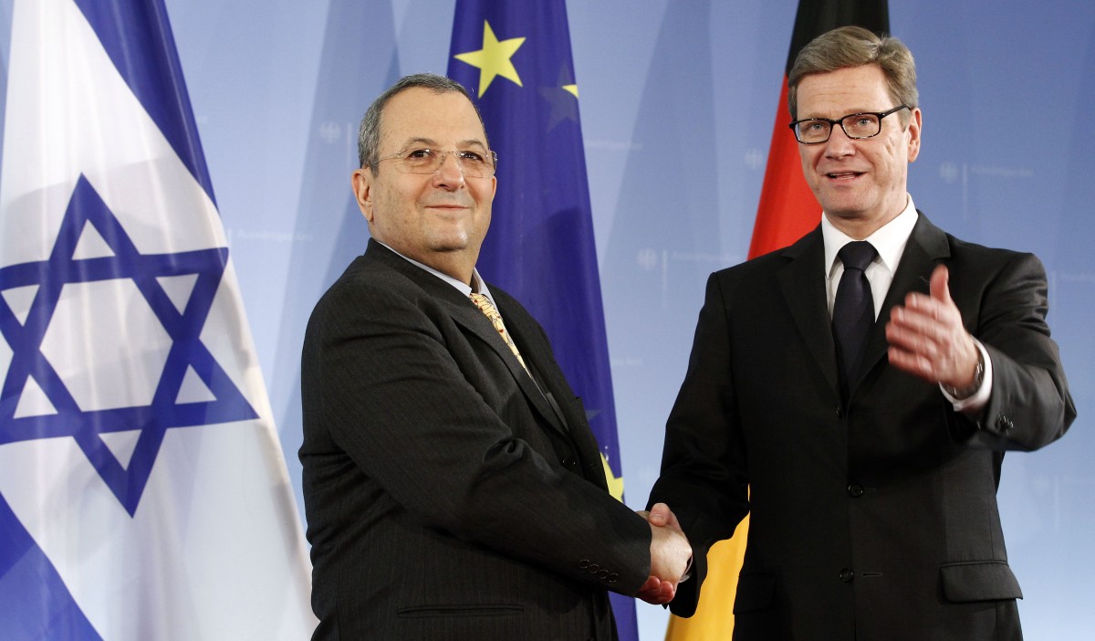 The Foreign Minister of Germany Guido Westerwelle, right, and the Defense Minister of Irsael Ehud Barak, left, shake hands prior to a meeting at the Foreign Office in Berlin, Germany, Wednesday, March 21, 2012. (AP Photo/Michael Sohn)