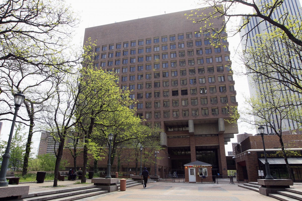 FILE - In this May 3, 2011 file photo, One Police Plaza is seen in New York. In the fall of 2010, the FBI and New York Police Department were working a terrorism investigation together on Long Island. The cyber case had been open for more than a year at the U.S. attorneys office in Brooklyn. So the Justice Department was surprised when, without notice, the NYPD went to federal prosecutors in Manhattan and asked them to approve a search warrant in the case. (AP Photo/Mary Altaffer, File)