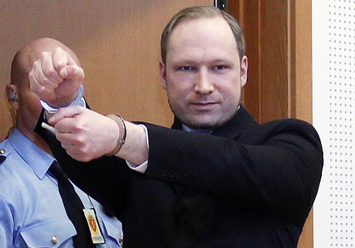 FILE - This is a Monday, Feb. 6, 2012 file photo of Anders Behring Breivik, a right-wing extremist who confessed to a bombing and mass shooting that killed 77 people on July 22, 2011, as arrives for a detention hearing at a court in Oslo, Norway. Norwegian prosecutors on Wednesday March 7, 2012 indicted Anders Behring Breivik on terror and murder charges for slaying 77 people in a bomb and shooting rampage but said the confessed mass killer likely won't go to prison for the country's worst peacetime massacre. Prosecutors said they consider the 33-year-old right-wing extremist psychotic and will seek a sentence of involuntary commitment to psychiatric care instead of imprisonment unless new information about his mental health emerges during the trial set to start in April. (AP Photo/Heiko Junge, Scanpix Norway, File) NORWAY OUT