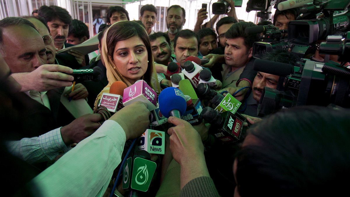 Pakistan's Foreign Minister Hina Rabbani Khar talks to media as she leaves after attending parliament's joint session in Islamabad, Pakistan on Tuesday, March 20, 2012. A parliamentary commission demanded an end to American drone attacks inside Pakistan and an apology for deadly U.S. airstrikes in November, as part of proposed new terms in the country's troubled relations with the United States. (AP Photo/Anjum Naveed)