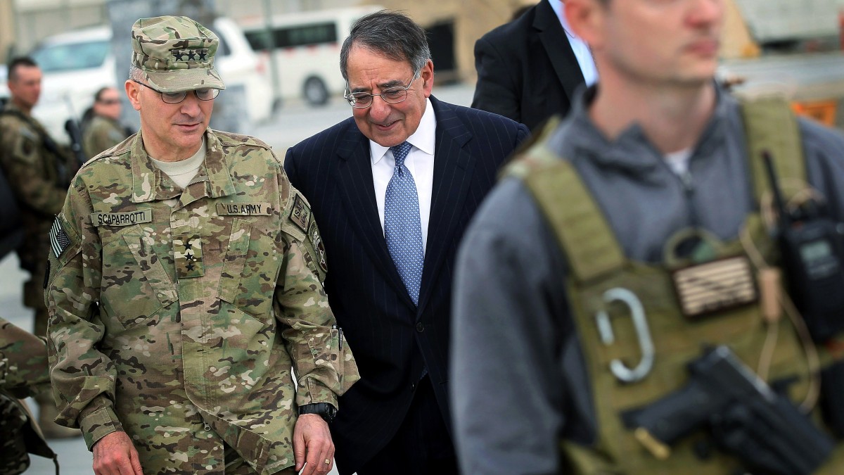 Defense Secretary Leon Panetta talks with Lt. Gen. Curtis Scaparrotti in Kabul, Afghanistan, Thursday, March 15, 2012, before leaving for United Arab Emirates. (AP Photo/Scott Olson, Pool)