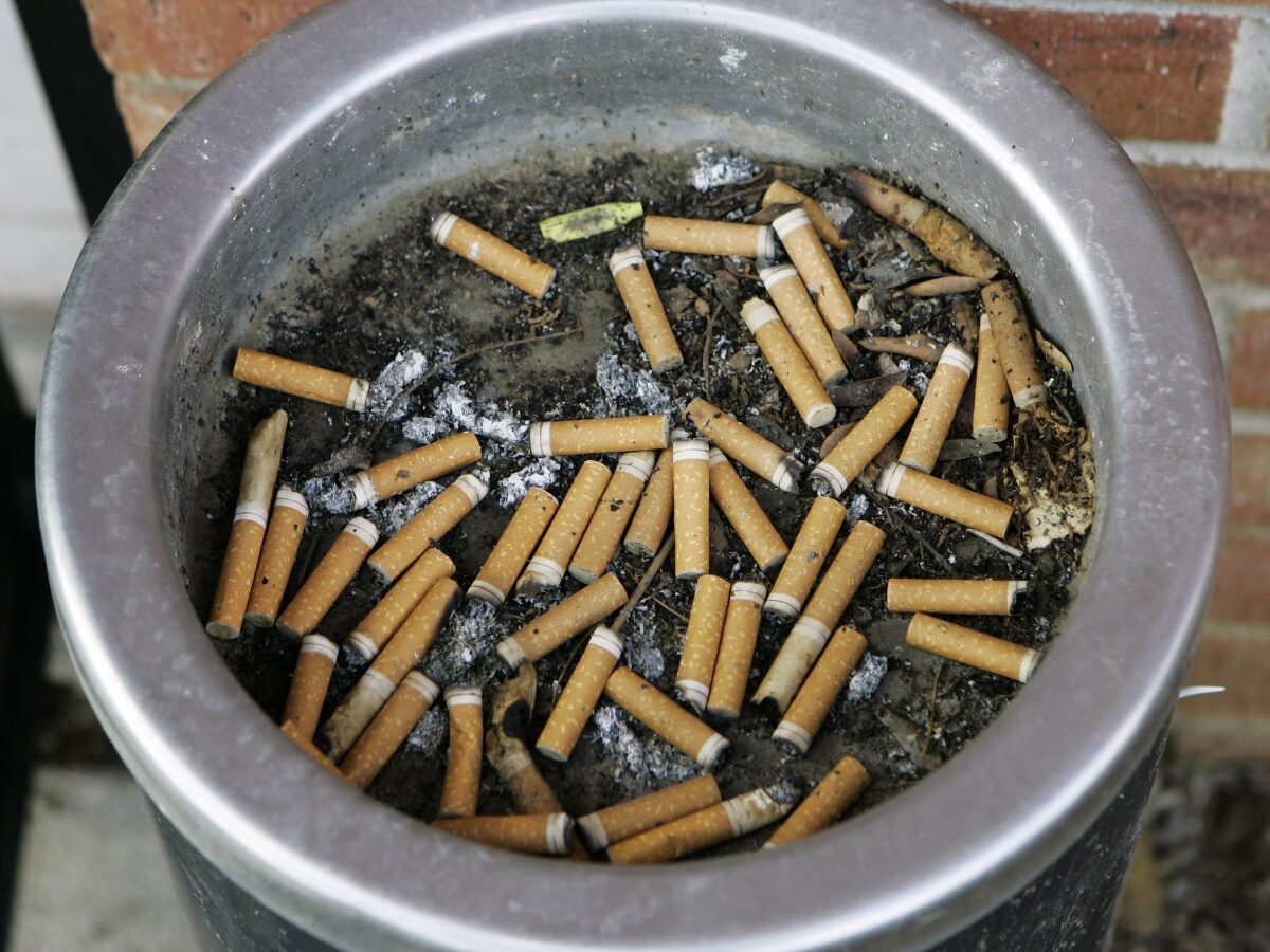 An ashtray full of cigarette butts is shown in Omaha, Neb., in this March 28, 2007 file photo. (AP Photo/Nati Harnik, File)