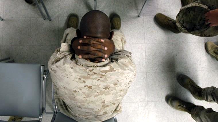 U.S. Marine Lance Cpl. Greg Rivers, 20, of Sylvester, Ga., waits to take psychological tests at the Marine Corps Air Ground Combat Center in Twentynine Palms, Calif. on Sept. 29, 2009. (AP Photo)