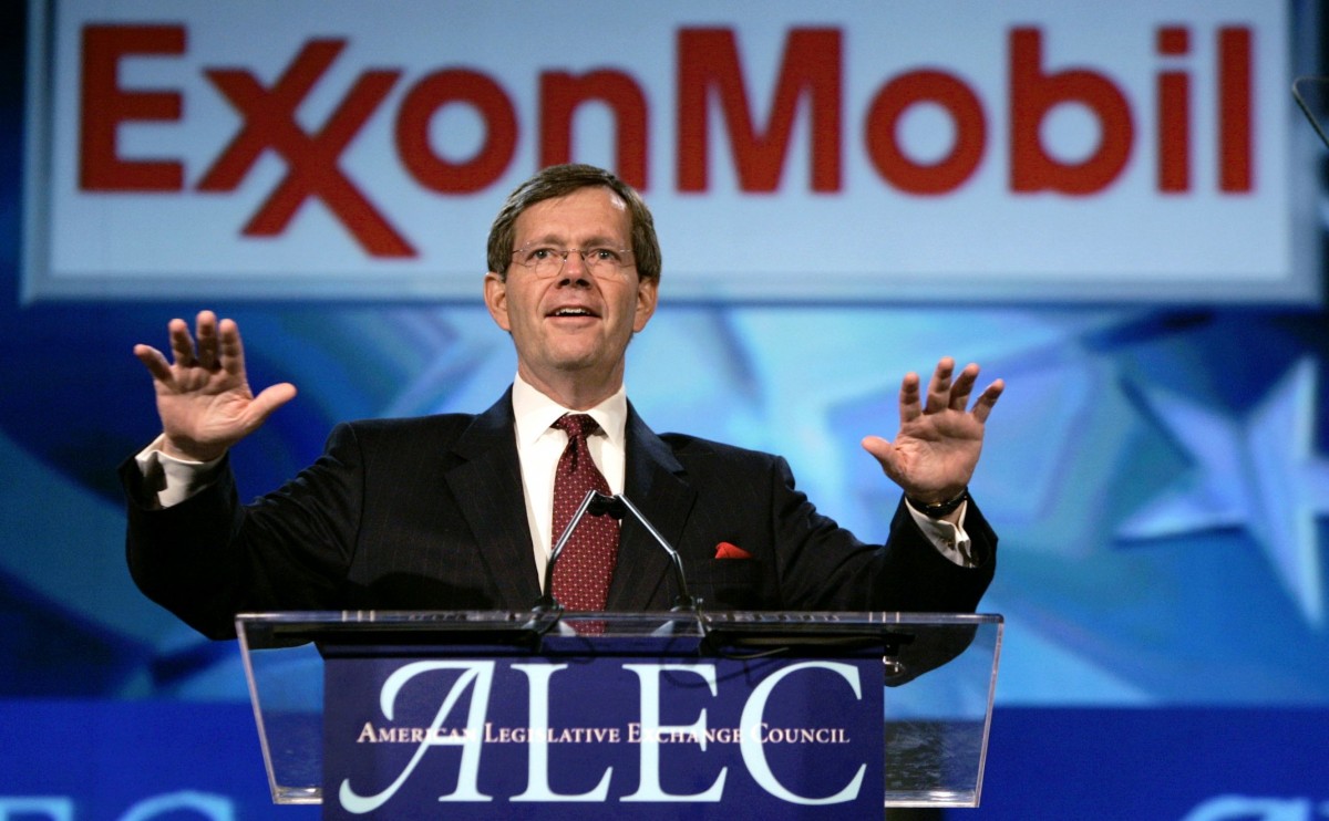 Environmental Protection Agency Administrator Michael Leavitt addresses members of the American Legislative Exchange Council Thursday, July 29, 2004, in Seattle. Behind Leavitt is a sign for the morning's sponsor, ExxonMobil. (AP Photo/Elaine Thompson)