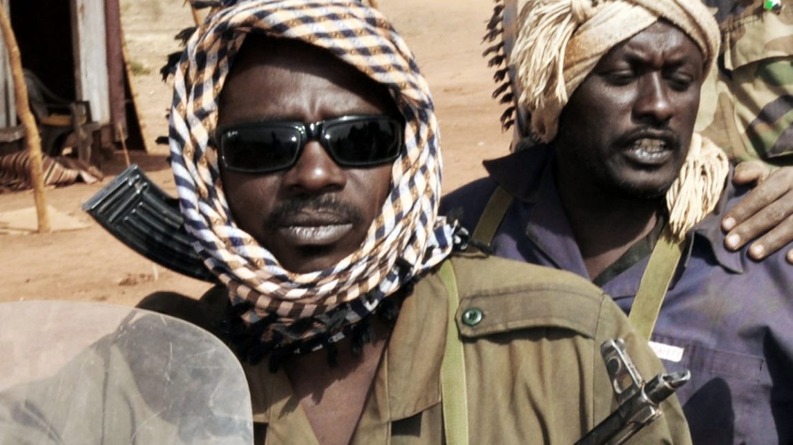 In this Wednesday, March 28, 2012 photo, Sudanese soldiers investigate the scene after South Sudan said it has pulled out its troops from a contested area along the border with Sudan shortly after clashes between the two countries' armies sparked fears of a return to war in Heglig, Sudan. Clashes between the Sudanese Armed Forces and South Sudan's army erupted Monday afternoon, but the two sides disagree on how the fighting started. The south says Sudan bombed its positions and then sent in ground troops. Sudan said the south started the fighting. (AP Photo)