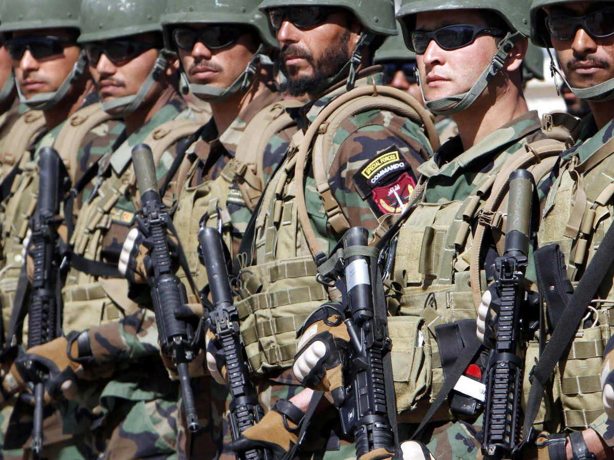 Afghan special forces stand in formation during their graduation ceremony at a military training center on outskirts of Kabul, Afghanistan, Thursday, April 5, 2012. (AP Photo/Musadeq Sadeq)