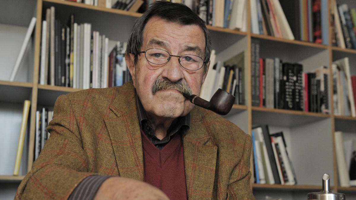 The Oct. 15, 2009 file photo shows German writer and Nobel Prize laureate for literature Guenter Grass during an interview with journalists of the Associated Press in the library of Steidl publishers in Goettingen, Germany. Grass is sharply criticizing Israel amid tensions with Iran and what he describes as Western hypocrisy over Israel's suspected nuclear program. In a prose poem published Wednesday, April 4, 2012 in German daily Sueddeutsche Zeitung, the 84-year-old Grass highlighted Berlin's recent sale to Israel of a submarine able to "send all-destroying warheads where the existence of a single nuclear bomb is unproven." (AP Photo/Jens Meyer)