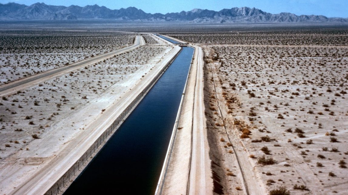 In this undated file photo, water flows through the Southern California desert in the Metropolitan Water District's Colorado River Aqueduct from the Colorado River to the Los Angeles area. A pricing dispute has sharply escalated hostilities between San Diego and the agency that delivers water to much of Southern California, straining an odd partnership already defined by years of lawsuits and heated rhetoric. The San Diego County Water Authority launched a website to attack the MWD, its largest supplier, saying it wanted to lift a veil of secrecy. The site displays a trove of internal documents obtained under California’s public records law, including references to a "Secret Society" and an "anti-San Diego coalition." (AP Photo/Metropolitan Water District of Southern California, File)