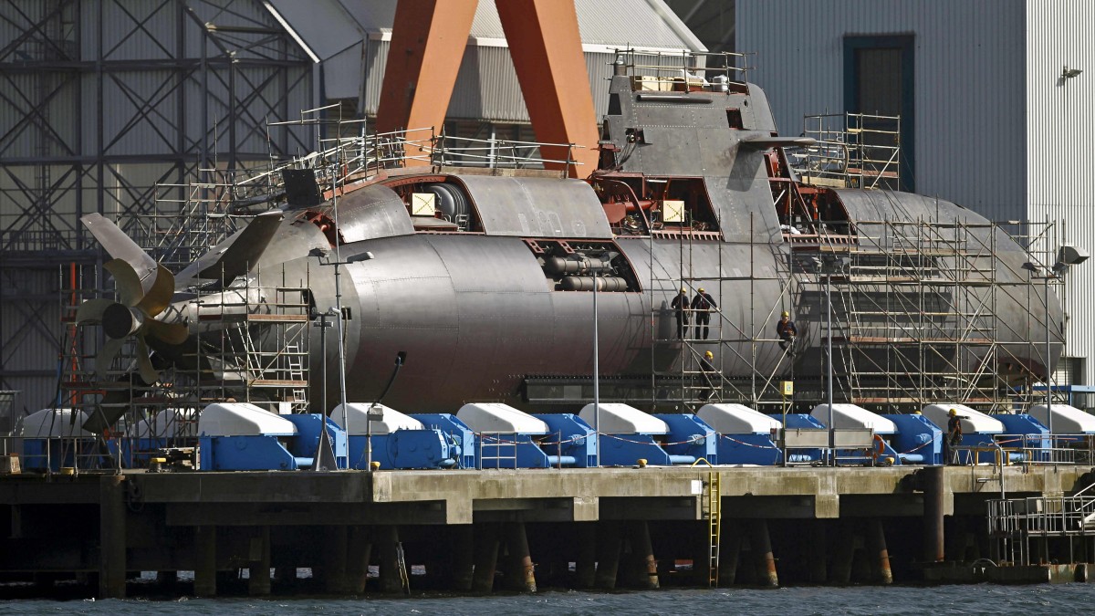 The March 27, 2012 photo shows a submarine of the Dolphin class at the Howaldtswerke-Deutsche Werft (HDW) shipyard in Kiel, northern Germany. German Nobel literature laureate Guenter Grass is sharply criticizing Israel amid tensions with Iran and what he describes as Western hypocrisy over Israel's suspected nuclear program. In a prose poem published Wednesday, April 4, 2012 in German daily Sueddeutsche Zeitung, the 84-year-old Grass highlighted Berlin's recent sale to Israel of a submarine able to "send all-destroying warheads where the existence of a single nuclear bomb is unproven." (AP Photo/dapd, Philipp Guelland)