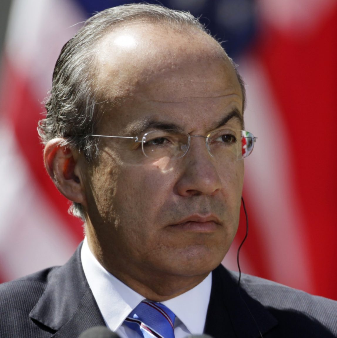 FILE - In this April 2, 2012 file photo, Mexican President Felipe Calderon participates in a joint news conference with President Barack Obama and Canadian Prime Minister Stephen Harper, in the Rose Garden at the White House in Washington. The government said Thursday that 68,000 guns recovered by Mexican authorities in the past five years have been traced back to the United States. (AP Photo/Carolyn Kaster, File)