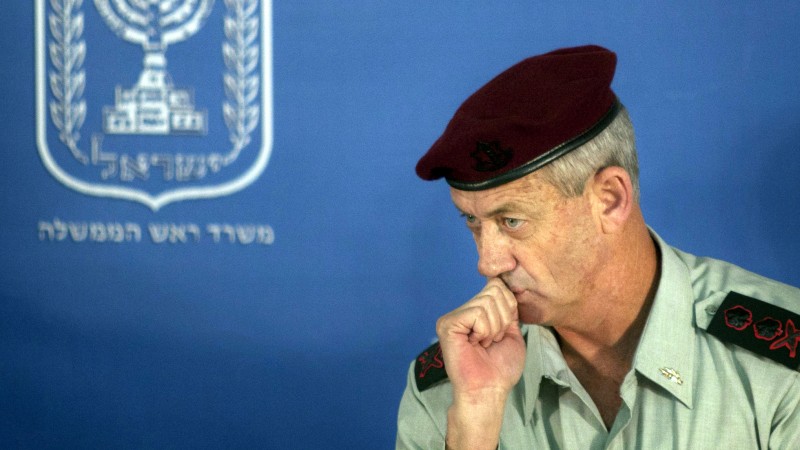 FILE - In this Feb. 14, 2011 file photo, Israeli Chief of Staff Lt. Gen. Benny Gantz looks on during a change of the epaulets ceremony in the Prime Minister's office in Jerusalem. Israel's military chief has hinted that other countries could also strike Iran's nuclear sites to keep the country from acquiring atomic weapons. (AP Photo/Sebastian Scheiner, File)