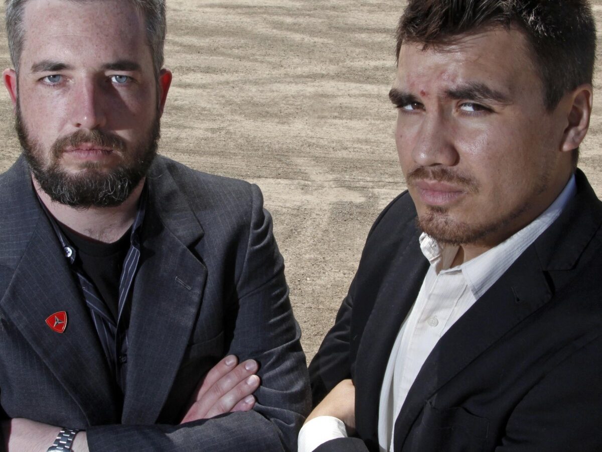 This Tuesday, April 10, 2012 photo shows Garrett Anderson, left, and his associate Antonio de la Torre in Palmdale, Calif. Long forgotten, except by the people who fought in it, the Second Battle of Fallujah was one of the deadliest, most terrifying events of the Iraq war. Anderson, a young Marine whose platoon was ambushed during that battle in November 2004 is documenting, not the bloodiest day of fighting he witnessed, but the impact it had on him and a dozen comrades who survived it. (AP Photo/Reed Saxon)