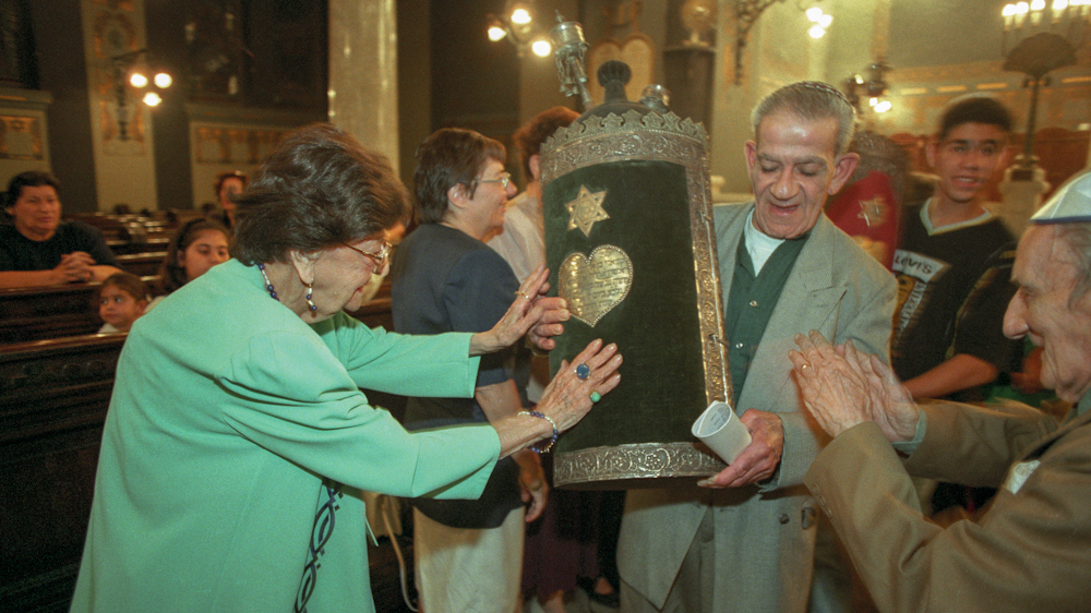 The last of Egypt's once thriving Jewish Community celebrating Purim at Shaar Hashamayim Synagogue, in the center of Cairo, Egypt in October 1997. (Photo by Norbert Schiller)