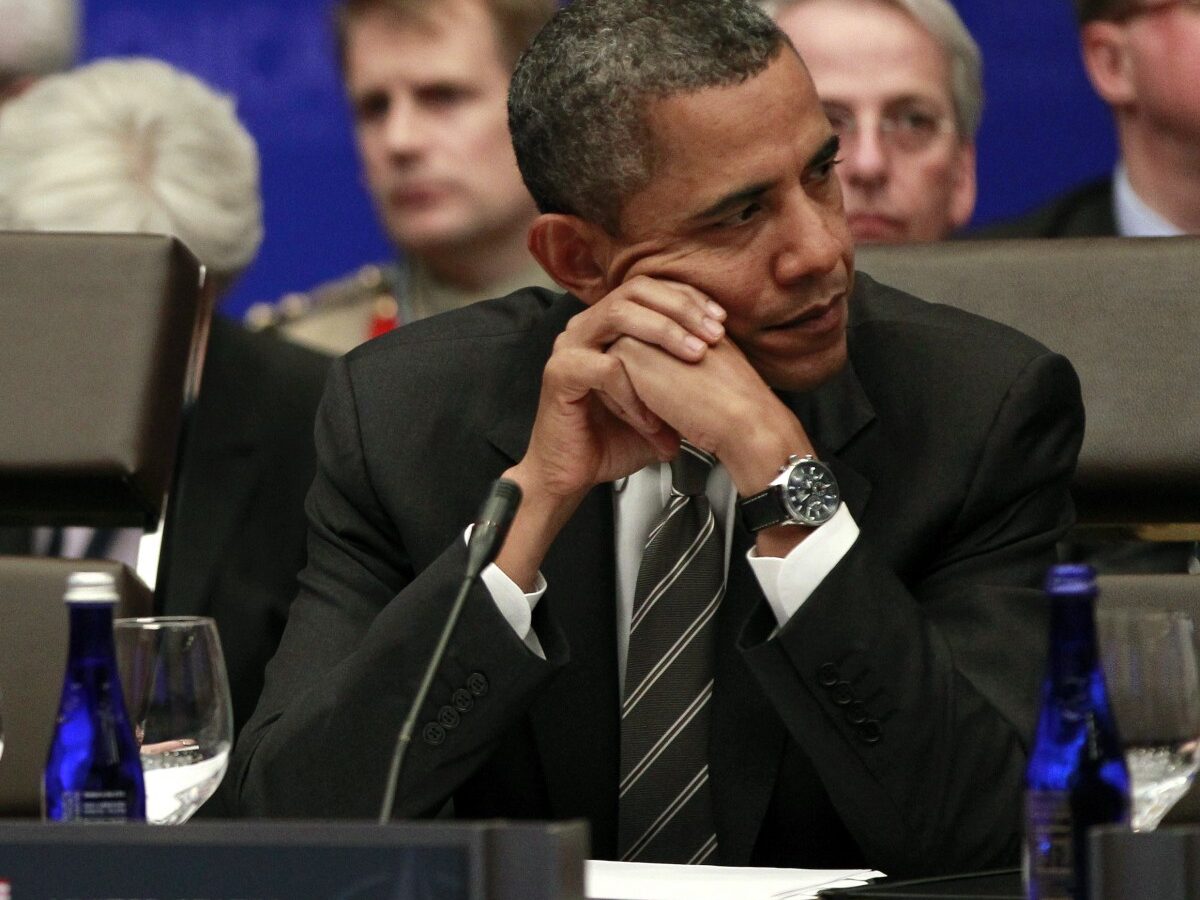 President Barack Obama, right, and British Prime Minister David Cameron, left, sit together at the start of the Partners Meeting at the NATO Summit in Chicago, Monday, May 21, 2012. (AP Photo/Pablo Martinez Monsivais)