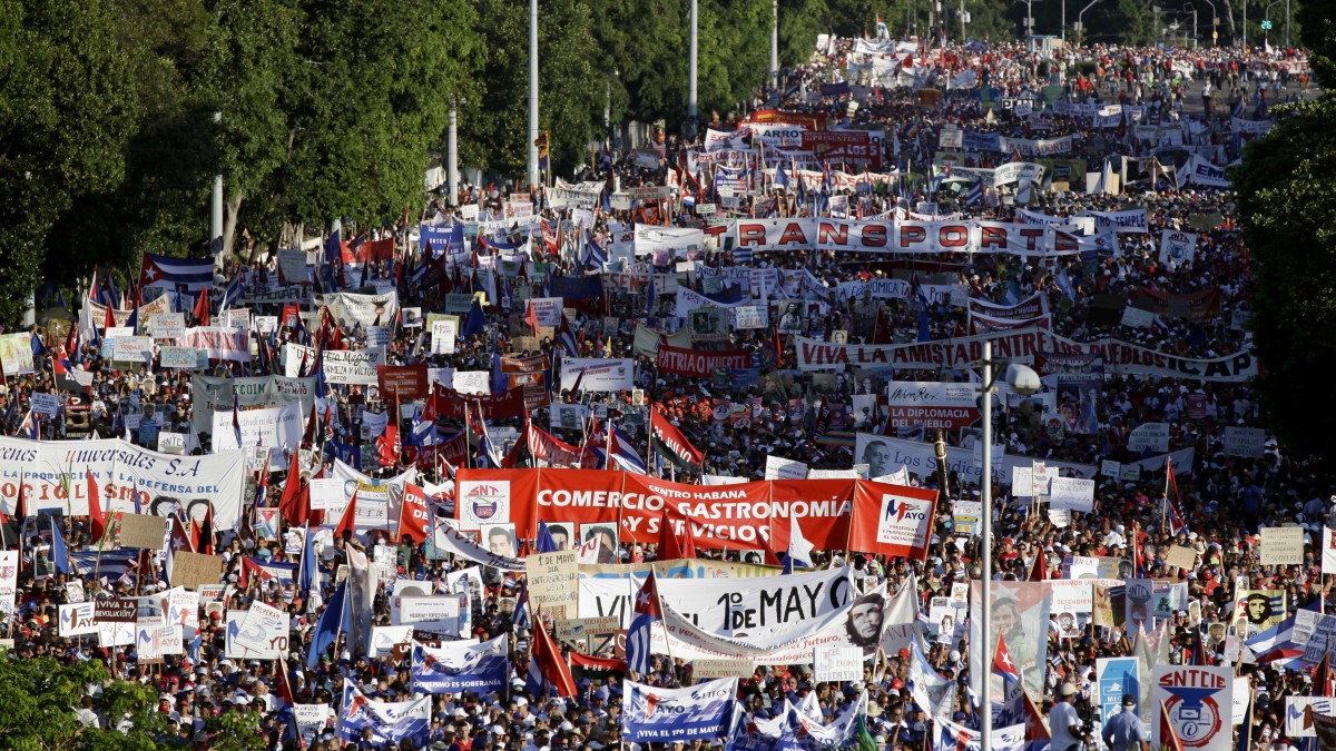 People gather for a May Day march in Revolution Square in Havana, Cuba, Tuesday, May 1, 2012. (AP Photo/Javier Galeano, Pool)