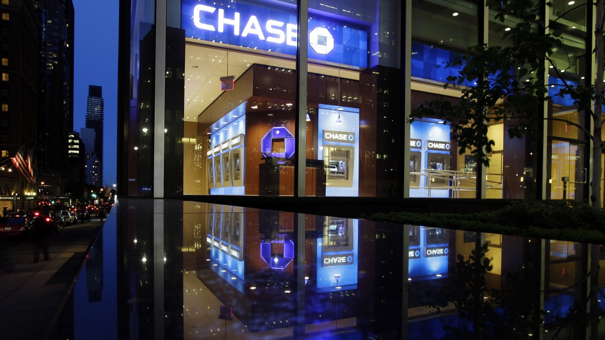 Automobiles pass a JP Morgan Chase building Thursday, May 10, 2012, in New York. (AP Photo/Frank Franklin II)