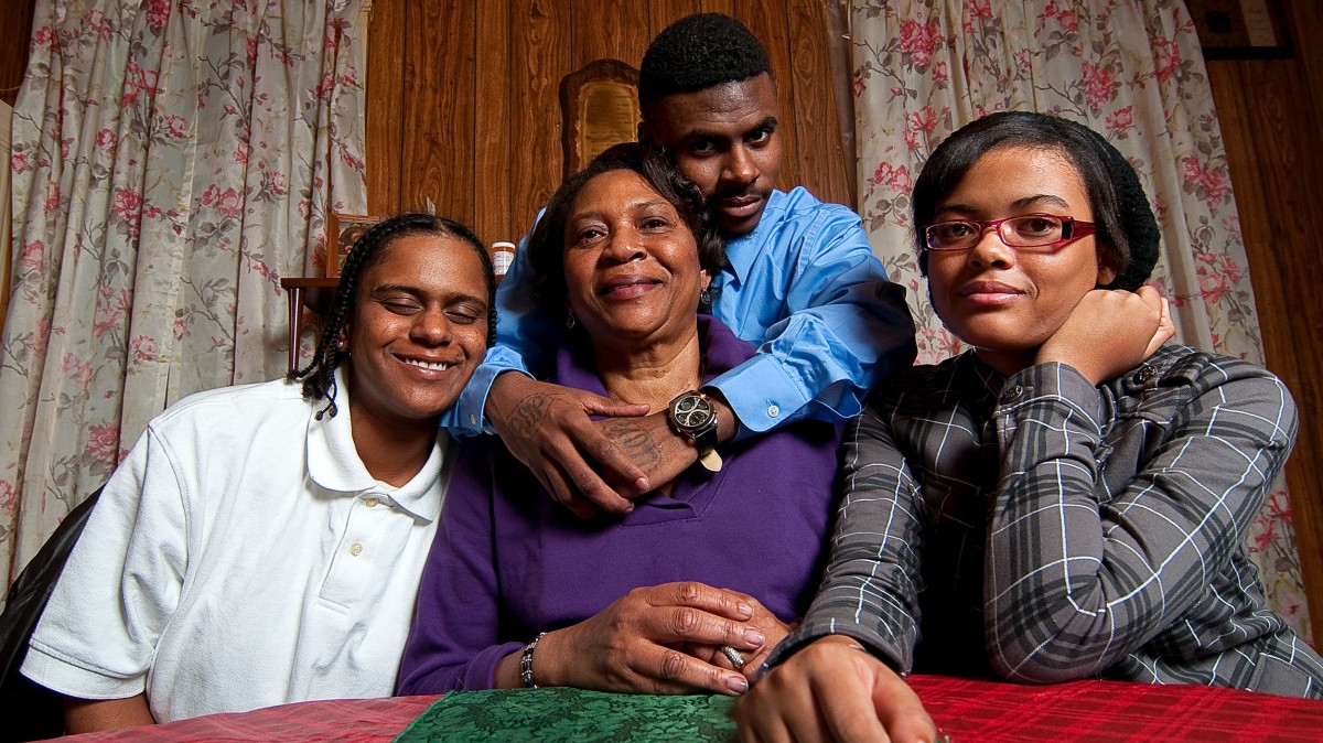 This February 2011 photo provided by MikeStogPhotography.com shows Morrisella Middleton, seated at center, at her home in Baltimore with three of her grandchildren. Middleton is among an increasing number of grandparents and other relatives raising children whose parents are unable to care for them. (AP Photo/MikeStogPhotography.com, Mike Stog)